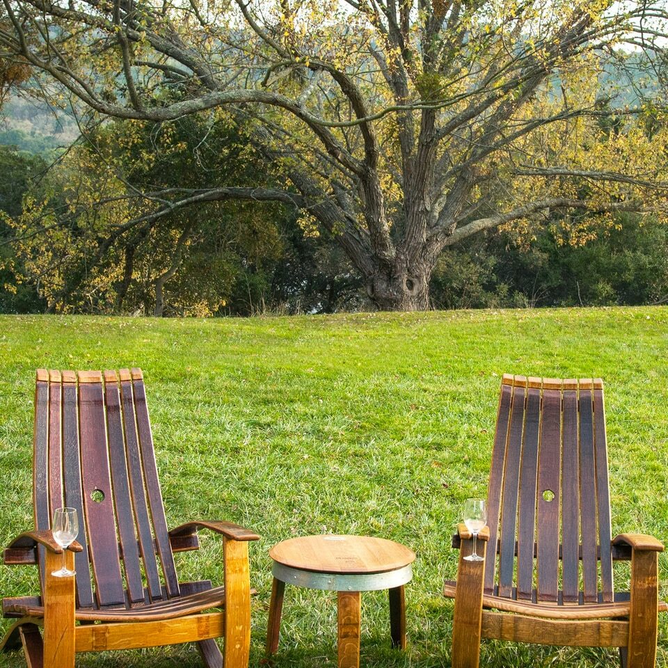 Chair Made From an Old Wine Barrel with a Wine Holder