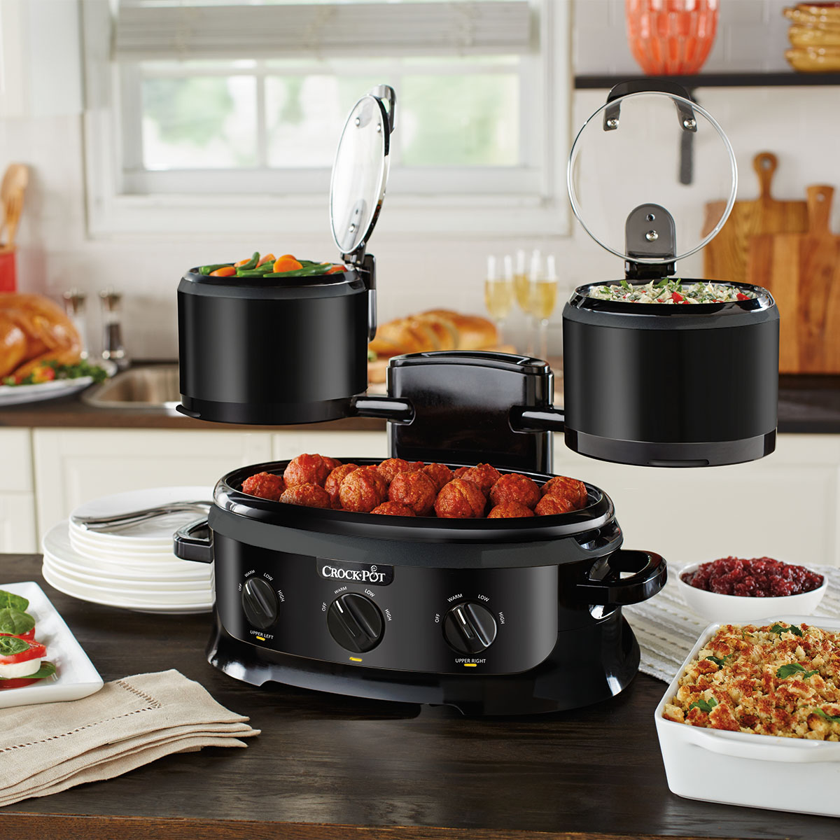 Crock-Pot Slow Cooks Three Dishes At The Same Time