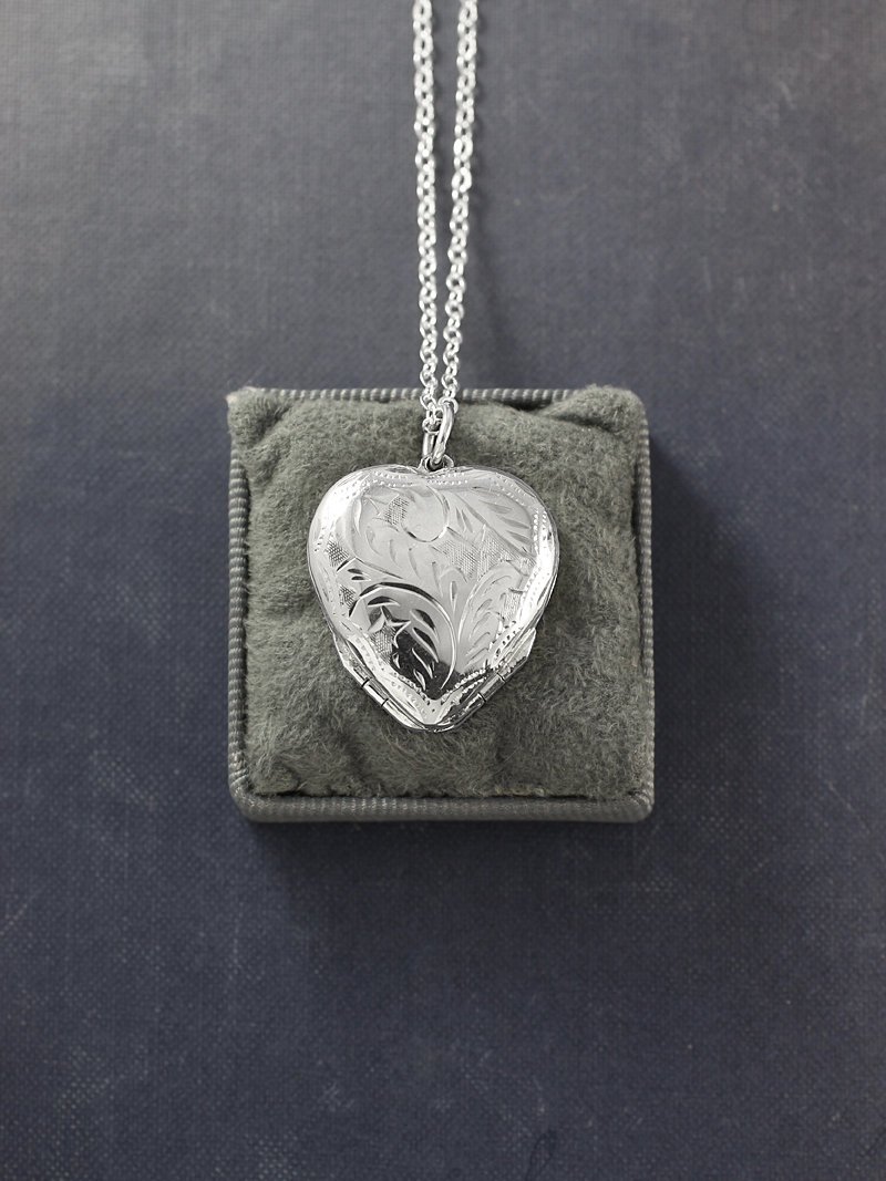 Four-Picture Silver Heart Locket Necklace
