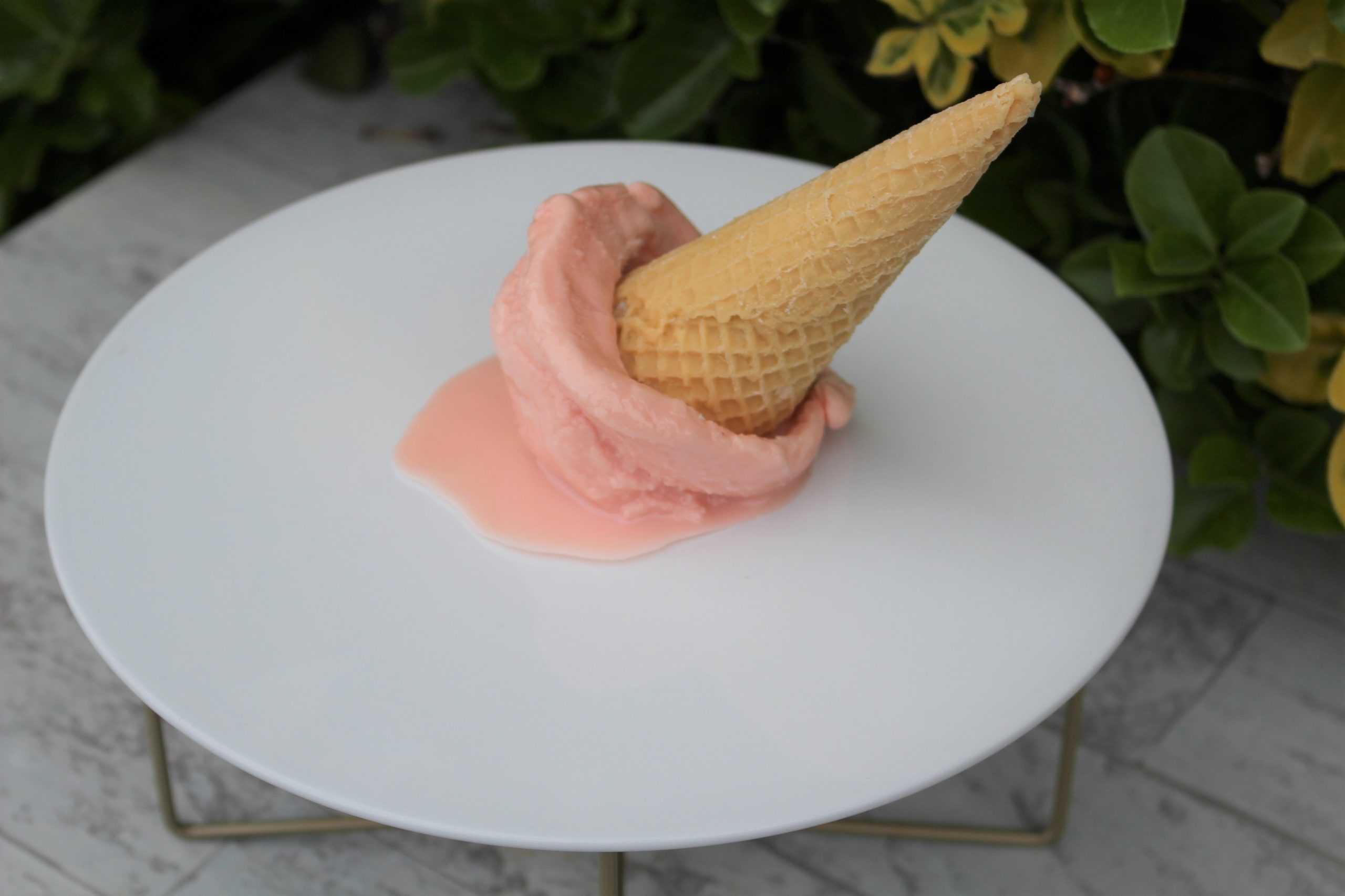 Melted Fake Strawberry Ice Cream Cone