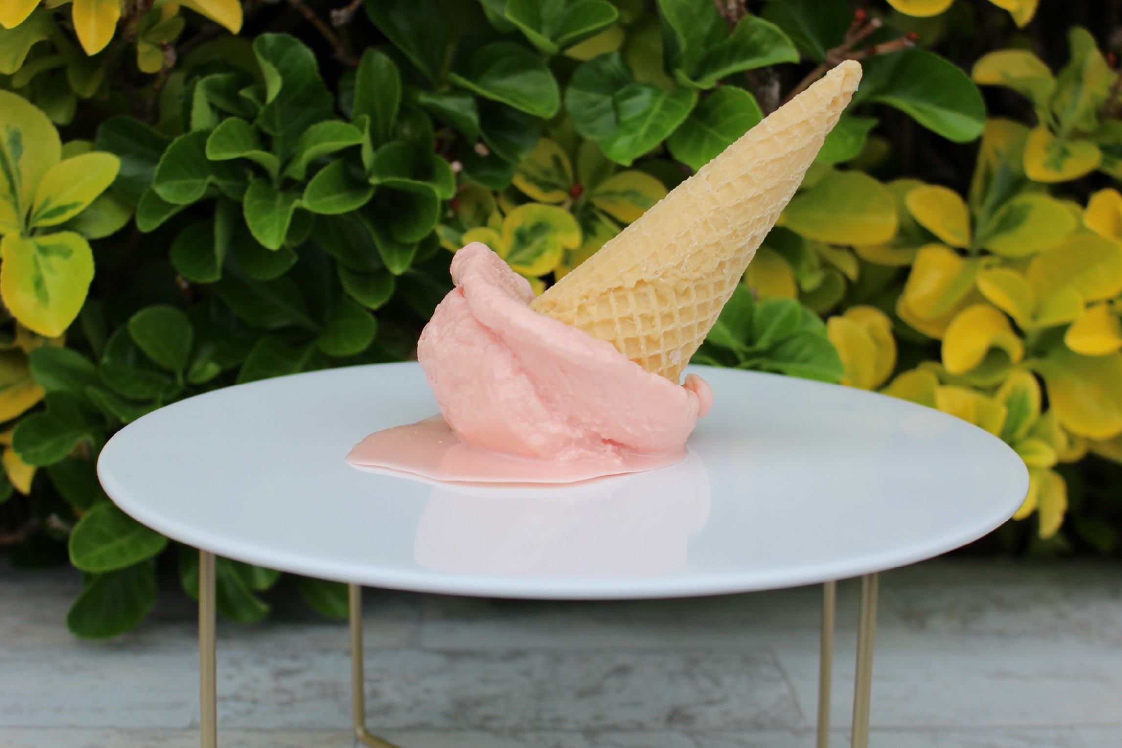 Melted Fake Strawberry Ice Cream Cone