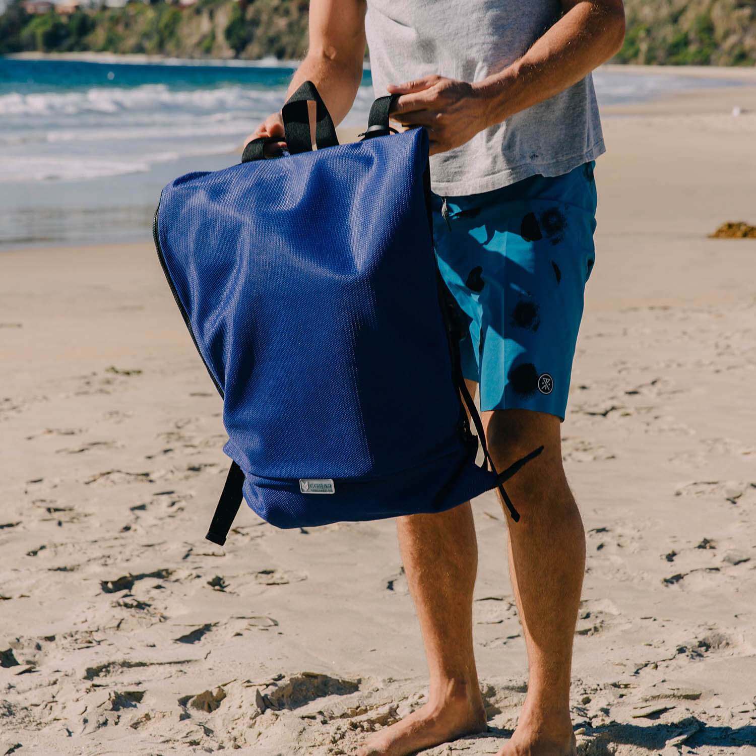 Sand-Free Transitional Backpack That Unfolds Into a Mat