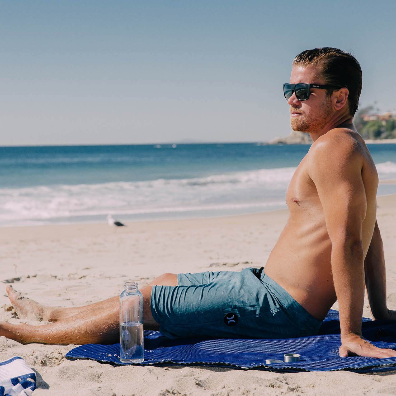 Sand-Free Transitional Backpack That Unfolds Into a Mat